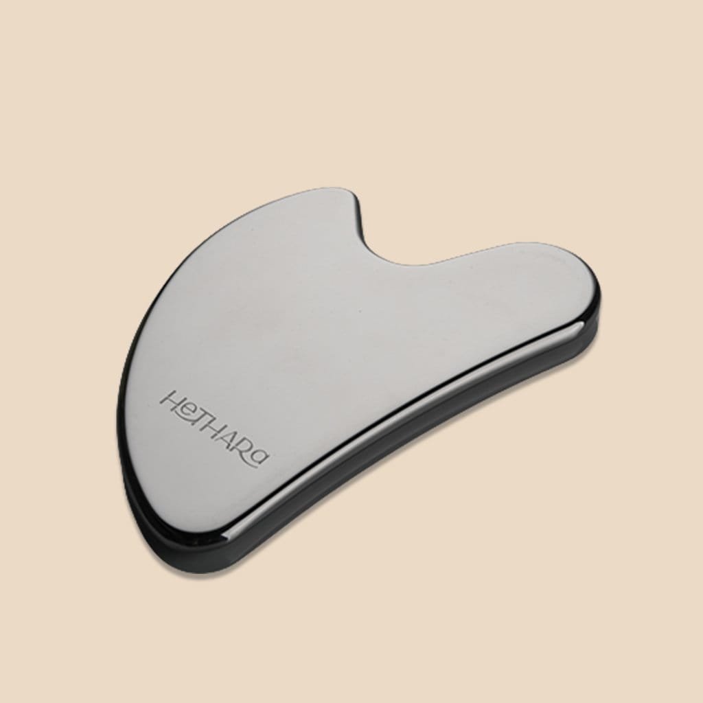 Stainless Steel Gua Sha – Hethara facial sculpting tool, angle view